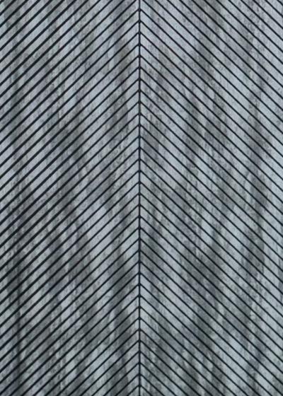 Wood composite slat sample, chevron slate in tone.