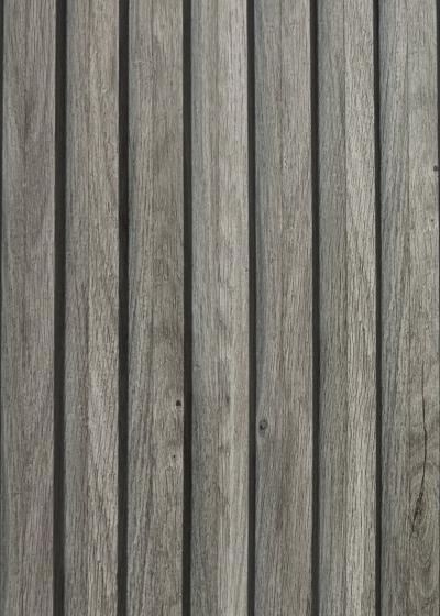 Wood composite slat sample, taupe grey in tone.